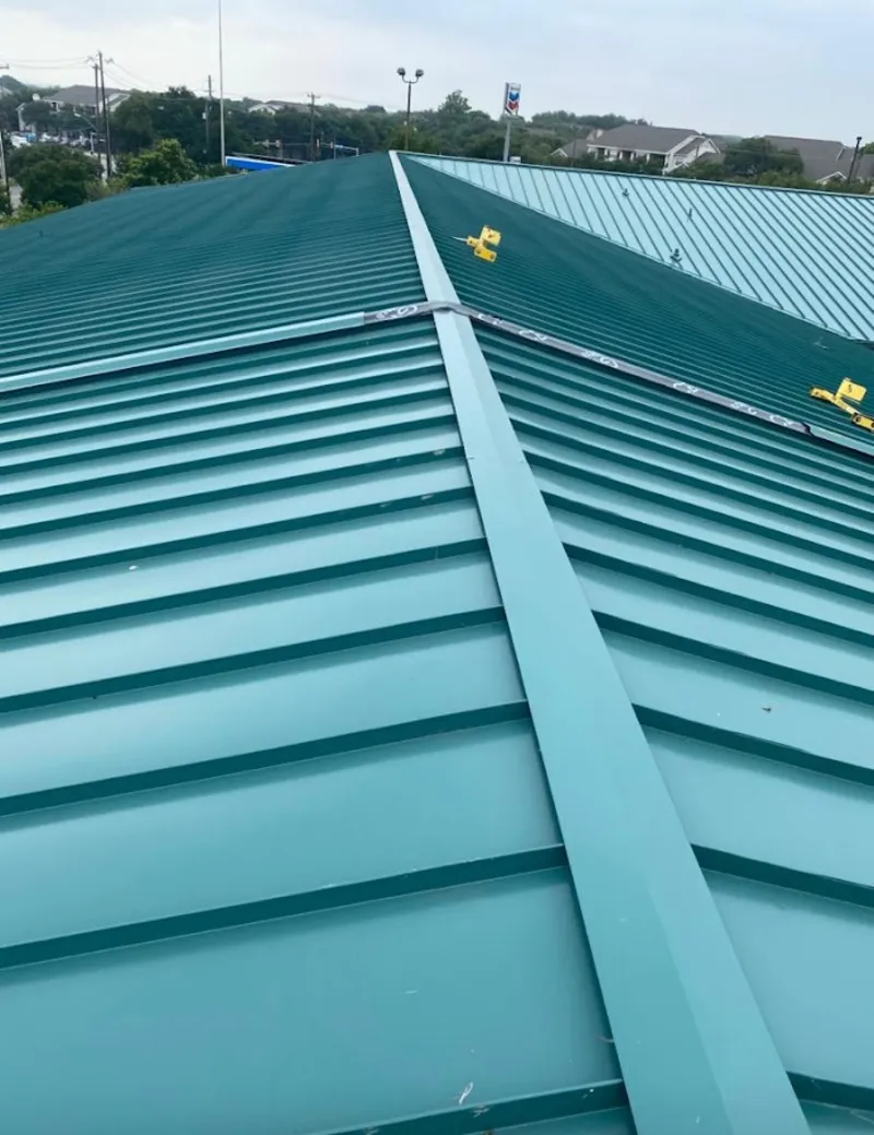 Green commercial metal roof ridge and valley for Metal Roof Repair in Glen Carbon