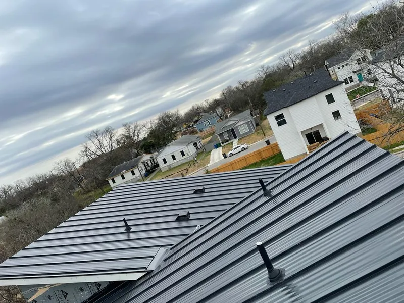 Standing seam metal roof panels with vents for Skylight Repair in Glen Carbon